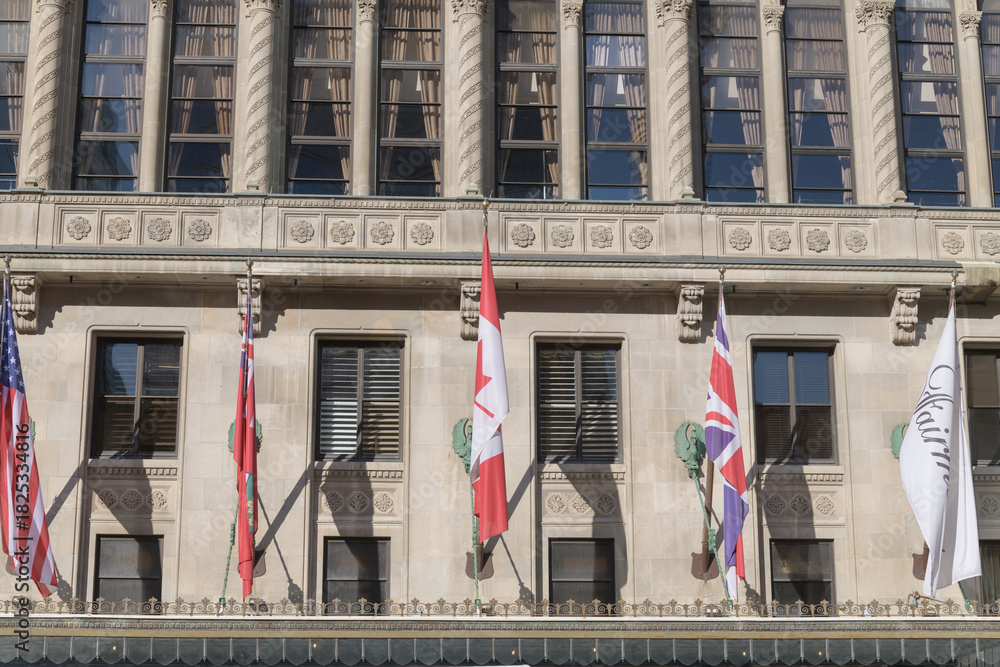 Fototapeta premium detail of front entrance facade of Fairmont Royal York, a five-star hotel, located at 100 Front St W, Toronto