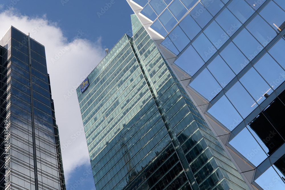 Fototapeta premium RBC Centre contrasted with the recessed carefully articulated three-dimensional glass surface of TD Terrace (at right), near King and Simcoe, Toronto