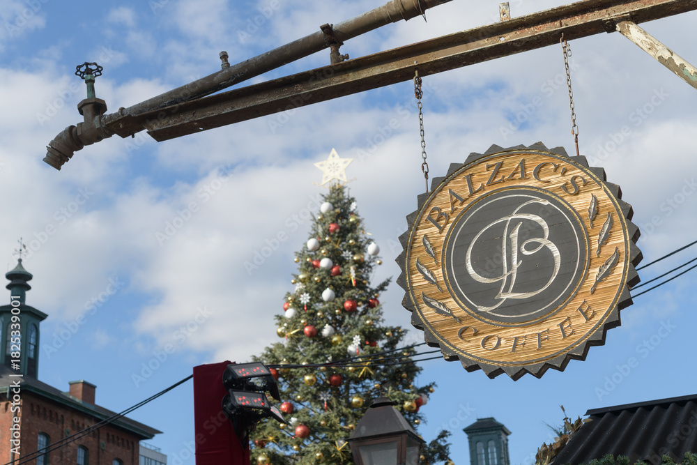 Fototapeta premium sign outside Balzac's Distillery District, a cafe, located at 1 Trinity St, Toronto