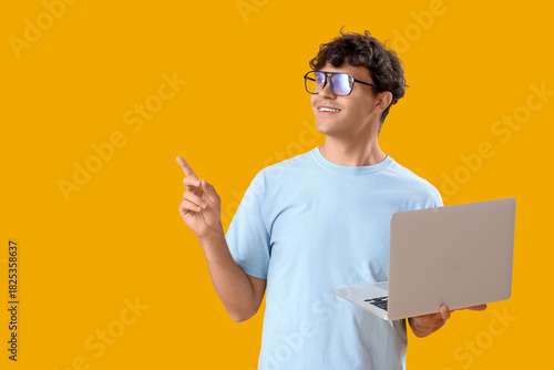 Male programmer with laptop...