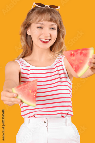 Young woman with slices of ...
