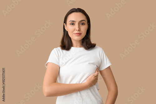 Young woman checking her br...