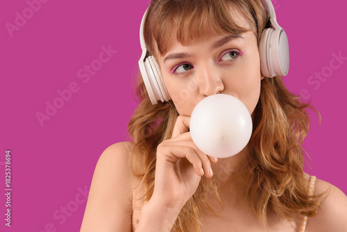 Young woman in headphones w...