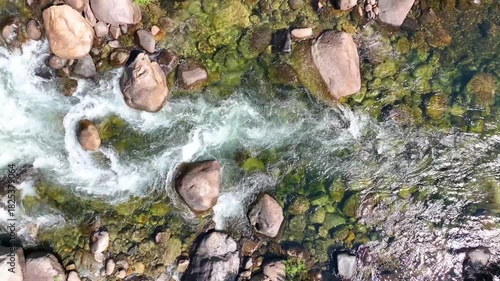 Aerial Clear River Rocky Rapids and Mossy Stones Stationary Top Down Shot