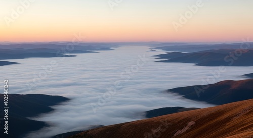 Majestic Mountain Sunrise Above a Sea of Clouds