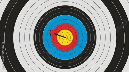 Close-up of an archery target with an arrow hitting the bullseye, symbolizing accuracy and precision