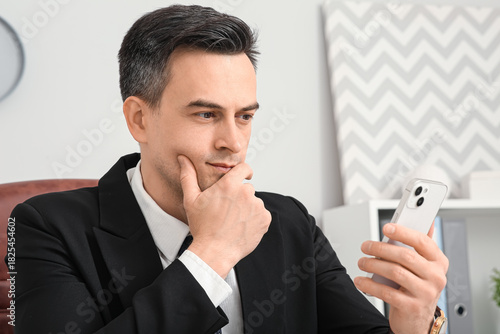Thoughtful young businessma...