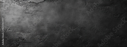 Dark textured concrete wall with rough and cracked surface showing aged and weathered details