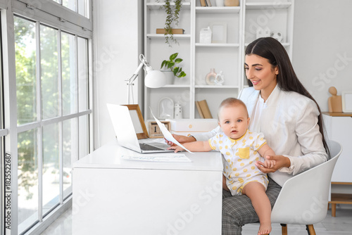 Young business mother with ...