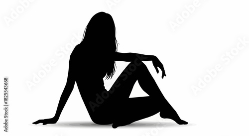 Silhouette of a woman sitting on the ground with her legs crossed.