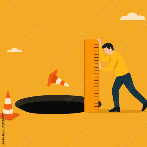 risk estimation, estimate business risk, businessman using a ruler measures the depth of a hole on the road