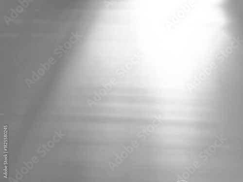 White cement wall background with transparent natural light overlay for graphic design or wallpaper.