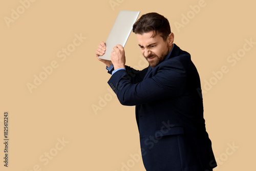 Angry businessman throwing ...