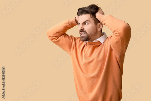 Angry male office worker on...