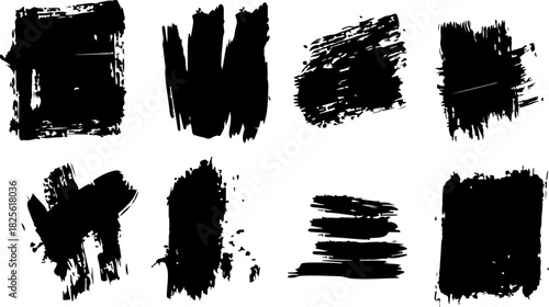 Collection of black grunge brush strokes and textured elements