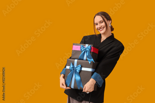 Happy young woman with gift...