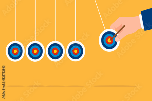 business target achievement as a milestone to achieve the next target, businessman pulling target board with bullseye arrow as e pendulum for milestone the next target