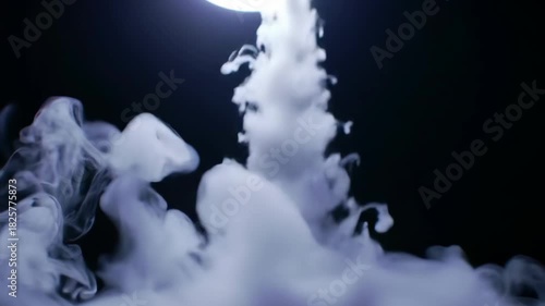 Ethereal smoke rising under a glowing orb in a dark setting, creating ambiance