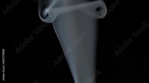 Ethereal smoke swirling gracefully against a dark backdrop, creating a mystical atmosphere