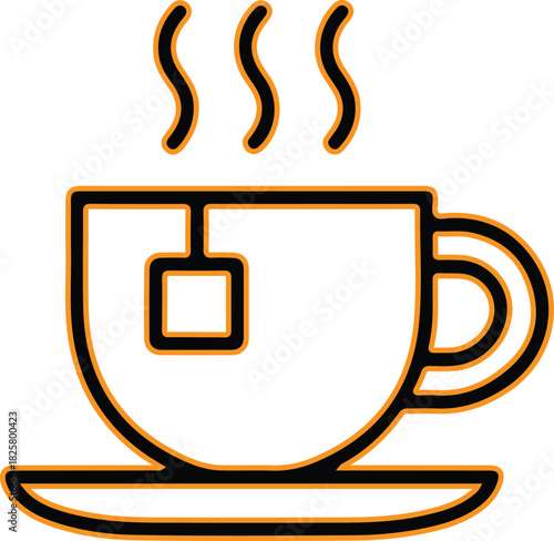 Steaming cup of tea with tea bag on saucer