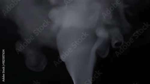 Ethereal smoke swirling gracefully against a dark background, creating a mystic ambiance
