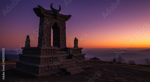 Stone Monument at Sunrise on a Mountaintop