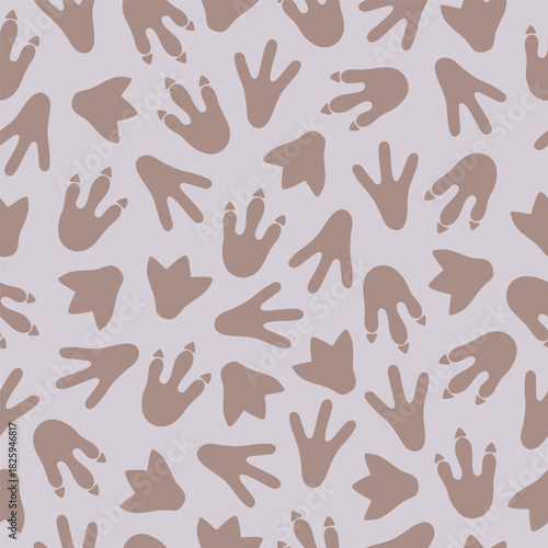 Dinosaur footprints on grey background seamless pattern. Template for print, fabric, wallpaper, wrapping paper. Vector illustration
