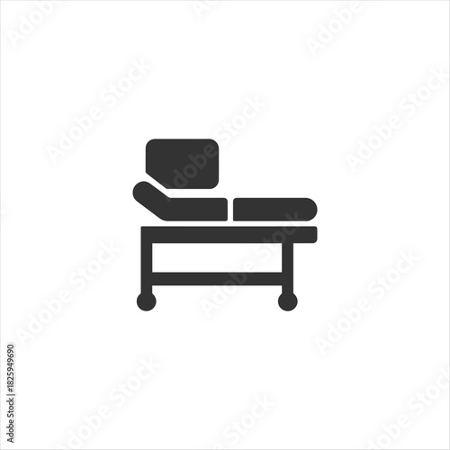 Black silhouette icon of a medical examination bed with wheels for patient assessment, hospital furniture, and clinical treatment.