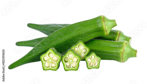 Close-up of sliced and whole okra pods against a stark black backdrop