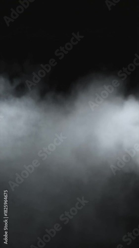 Thick white fog on dark background suitable for spooky or mysterious designs, eerie atmosphere, halloweenthemed projects, or horror concepts.