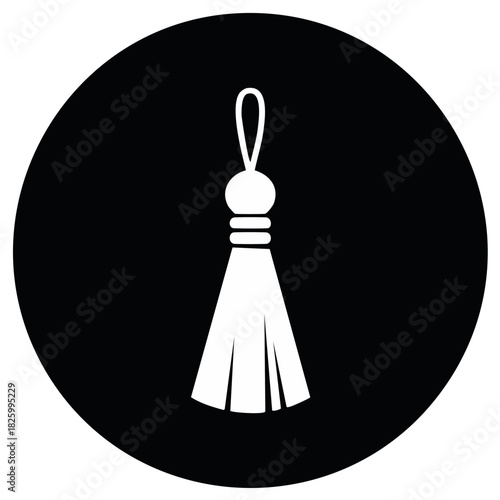 White tassel design in black circle decorative textile accessory icon