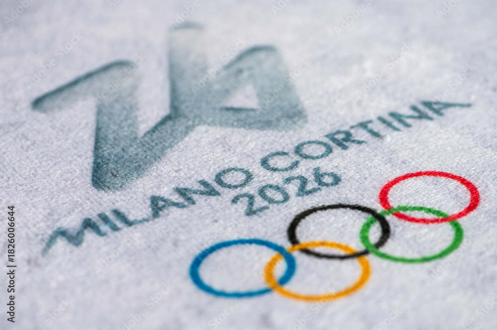 Fototapeta premium Logo of Winter Game 2026 in Milano and Cortina, Italy. White background, macro and detail
