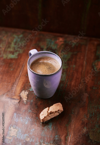 Cup of coffee on rustic wooden background. Soft focus. Copy space	