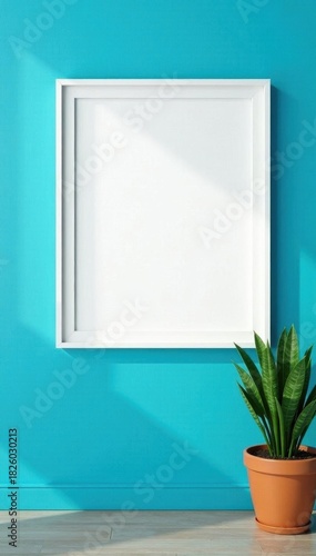 Blank white frame against a vibrant blue wall, featuring subtle plant accents, presentation, white frame