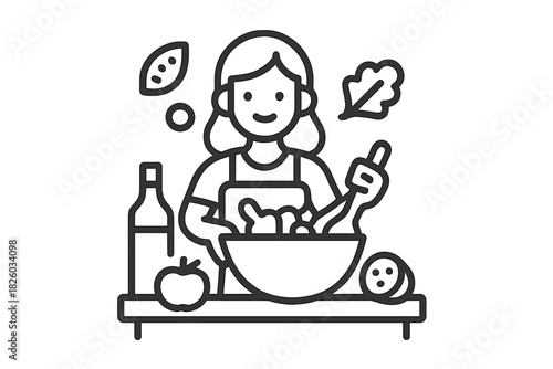 Smiling woman preparing a fresh healthy salad in a mixing bowl on a kitchen counter