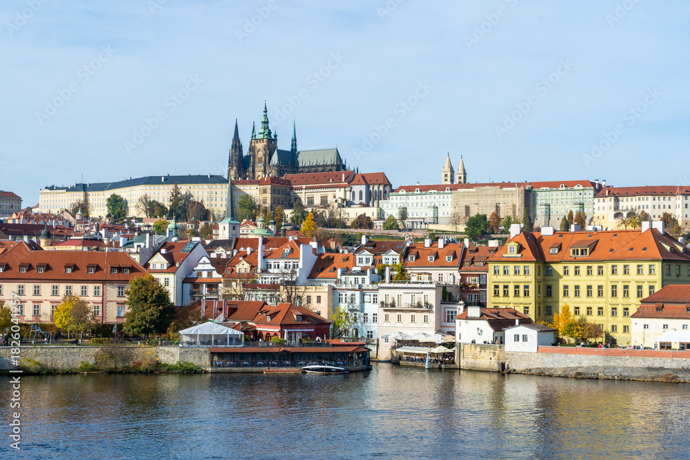 Fototapeta premium Cityscape of Prague with Vltava River in Czechia from Charles Bridge Praha Castle Old Town roofs