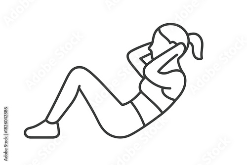 Woman performing abdominal crunch exercise for fitness and core strength development