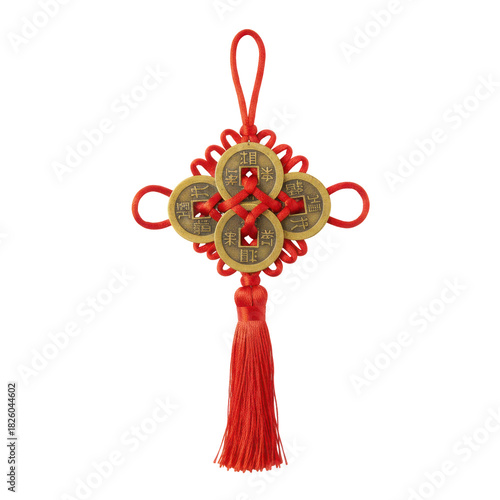 A close-up shot of a traditional Chinese lucky knot with coins, isolated on black background