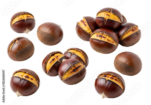 Multiple roasted European chestnuts with dark matte shells, some split revealing warm golden-brown mealy flesh, on a transparent background with copy space, concept for autumn food promotion