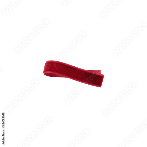 Elegant Red Velvet Ribbon Accent on a Stark Black Background for Design Projects