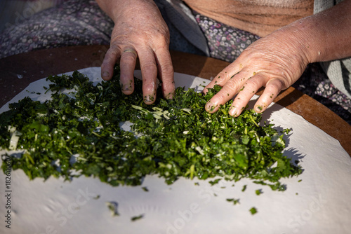 Traditional Gozleme Preparation with Herbs