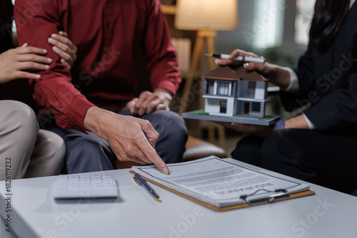 Wallpaper Mural Client signing home insurance document with agent Torontodigital.ca