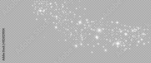 The dust sparks and white stars shine with special light. Vector sparkles on a transparent background. Christmas light effect.