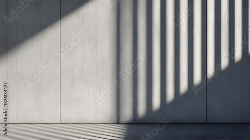 Shadow Play on Concrete: A modern architectural composition featuring striking shadows cast across a sleek concrete surface, creating a visual dance of light and form.