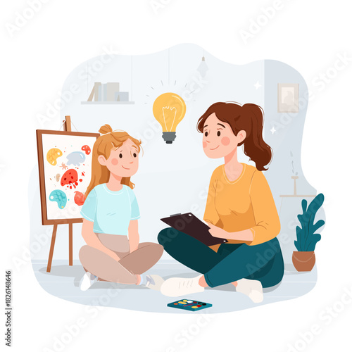 Therapist with young girl during art therapy session