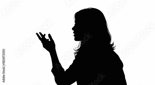 Silhouette of a woman gesturing with her hand in a thoughtful pose.