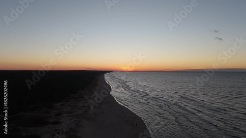 Sunset Over Lilaste Beach Aerial Drone View of the Baltic Sea in Autumn, Latvia the Baltic Sea Coastline With Golden Hour Light, Waves, Sand Dunes and Serene Coastal Landscape in Northern Europe
