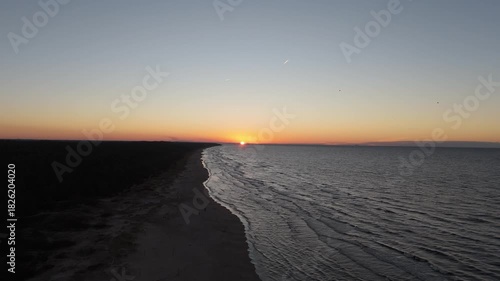 Sunset Over Lilaste Beach Aerial Drone View of the Baltic Sea in Autumn, Latvia the Baltic Sea Coastline With Golden Hour Light, Waves, Sand Dunes and Serene Coastal Landscape in Northern Europe