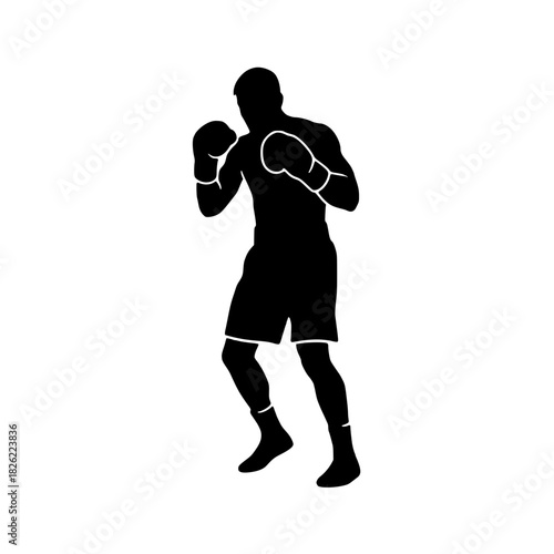 Powerful boxer in fighting stance ready for action, showcasing strength and determination