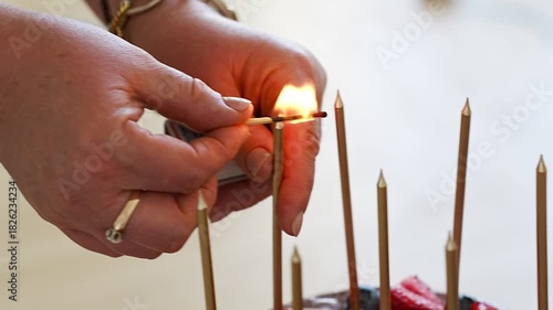 Celebrating with cake candles and sparklers at home